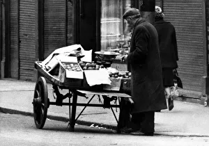 Fruit Prints: A street trader with his barrow on the streets of Newcastle on 5th April 1966