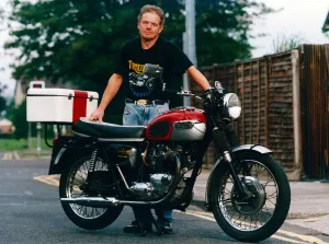 Motorcycles0414 Prints: Stuart is pictured with the 1968 Triumph Trophy 650 Twin which he hopes will be joined by
