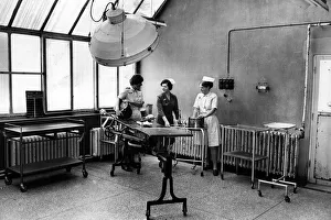 Nurse Prints: Student nurses Vicky Bowron and Sally Taylor help assistant matron Miss Jean Shaw move