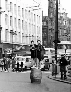 Barrel Prints: Students do a barrel dance during rag week in Newcastle in October 1963