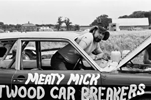 01255 Prints: Stunt driver Mick Stirrups comes down to earth with a crash after tying to leap over