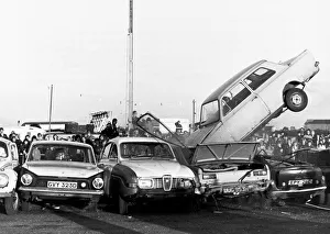 Stunt Prints: Stunts Stunt woman Jacquie Creedy crashes her car after trying to jump a number of cars