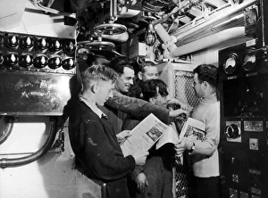 Submariners, pictured reading the Daily Mirrors Good Morning Newspaper