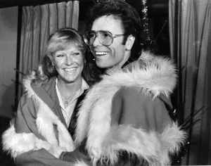 Sue Barker and Cliff Richard laughing during Variety Club lunch - December 1983