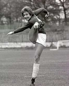 Sue Lopez Woman Football Player showing off her high kick