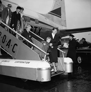 Suez Crisis 1956 British civillians return to a wet United Kingdom after leaving