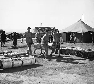 Tents Prints: Suez Crisis 1956 British Paratroopers in Cyprus loading canisters with equipment to