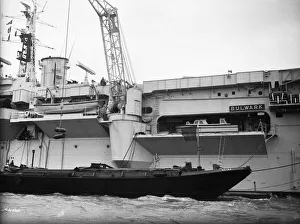 Ec Scan Prints: Suez Crisis 1956 A crane hoists huge artillery shells aboard onto the aircraft