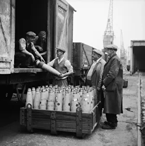 Ammunition Prints: Suez Crisis 1956 Dockers putting 80lb shells into crates marked