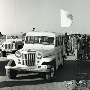 Egypt Prints: Suez Crisis 1956 Under a flag of truce UNO vehicles prepare to drive through