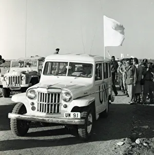 Africa Prints: Suez Crisis 1956 Under a flag of truce UNO vehicles prepare to drive through