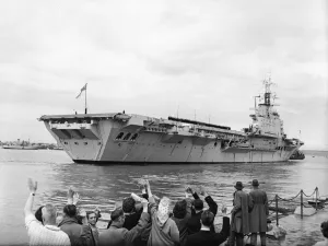 Dockyard Prints: Suez Crisis 1956 Friends and relatives wave goodbye as the aircraft carrier HMS