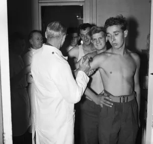 Injection Prints: Suez Crisis 1956 Men of the Household Cavalry receive inoculations for their return