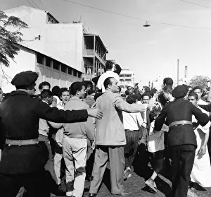 Suez Crisis 1956 Police keep crowds of gyptians back as United Nations troops march