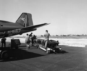 Suez Crisis 1956 RAF ground crew loading bombs onto Canberras on an airfield in