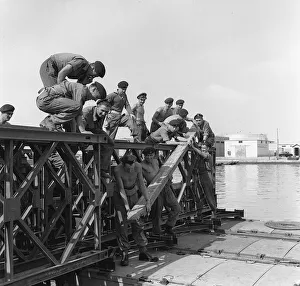 News Prints: Suez Crisis 1956 Royal Engineers in Port Said in Egypt build a Bailey Bridge over