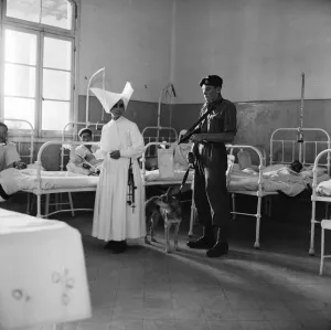 Regiment Prints: Suez Crisis 1956 Royal Marine Andrew Hall accompanies Sister Mary Joseph on her