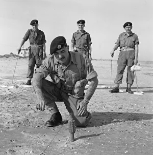 Suez Crisis 1956 Seargent Bill Kidd of the Royal Engineers prepares a mine for