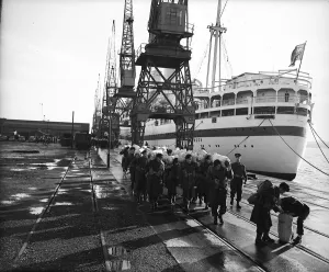 00174 Prints: Suez Crisis 1956 Troops walking along quay after having disembarked from