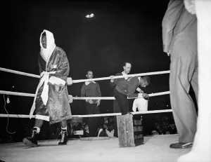 Sugar Ray Robinson enters the ring for his fight against Randolph Turpin at Earls Court