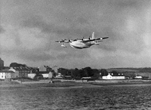 Plane Prints: A Sunderland Flying Boat spreads its wings over the Pembrokeshire village of Neyland as