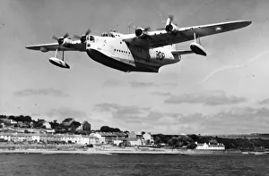 Plane Prints: A Sunderland Flying Boat spreads its wings over the Pembrokeshire village of Neyland as
