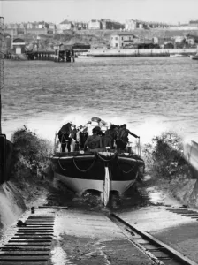 Accidents Prints: A Sunderland lifeboat launches into floating crude oil left by a passing ship