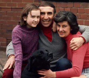 Sunderland manager Bob Stokoe poses in the back garden of his home with his wife Jean