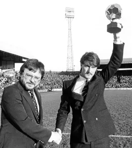 Suits Prints: The Suns sports writer Bob Cass congratulates David Hodgson on his Golden Ball Award