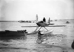 A Supermarine S6B Seaplane powered by a Rolls Royce engine seen here being towed back to