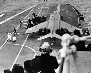 Carrier Prints: A supermarine Scimitar is manoeuvred on to the starboard catapult ready for take off