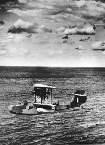 Supermarine Walrus aircraft from RAF Coastal Command Air Sea Rescue flies low over