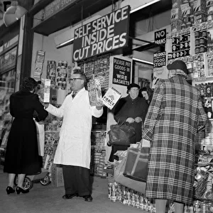 Supermarket Shopping March 1958 Shopkeeper promoting his products to customers