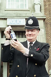 Police Officer Prints: Supt Roger Bagley of Dudley Police with a bottle of Bobby Bitter s