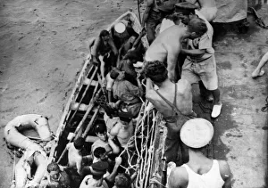Rescued Prints: Survivors of a destroyed R. A. F. Sunderland Flying Boat rescued by a British destroyer