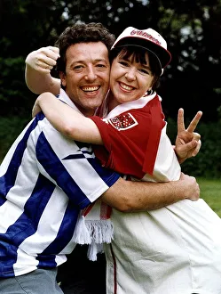 Susan Tully actress with Ian Reddington Actor in rival football kits Circa May