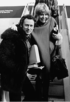 Susannah York and her husband - February 1972 Boarding the plane for