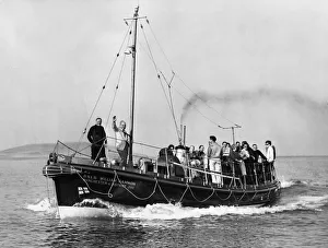 Exercise Prints: Swansea lifeboat cruises go round Swansea Bay after it had been launched to stage a mock