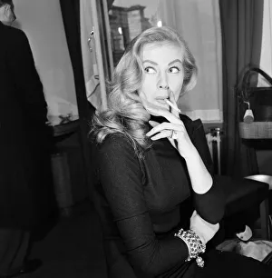 Swedish actress, Anita Ekberg, pictured in her hotel room at The Savoy, London