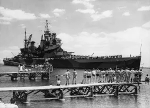 01442 Prints: Swimming club visitors gather on the diving boards to watch the passage of the Royal Navy