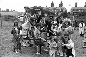 Swings and roundabouts... Crosland Moor children enjoy themselves at the new Walpole