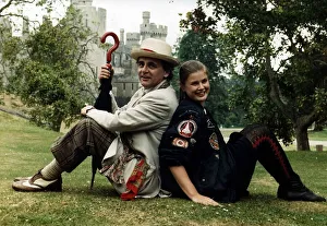 Sylvester McCoy actor who plays the part of the 7th Dr Who -sitting back to back with