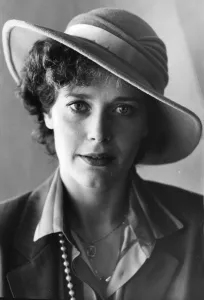 01428 Prints: Sylvia Kristel smiling wearing hat during interview - November 1981 03 / 11 / 1981