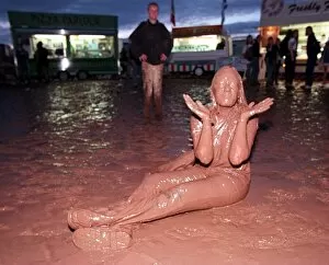 Images Dated 14th July 1997: T in the Park July 1997 A music fan covered in mud at the T in the Park music festival