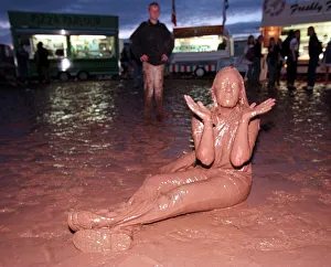 T in the Park July 1997 A music fan covered in mud at the T in the Park music festival