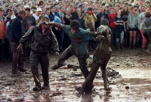 T in the Park July 1997 People mud fighting at T in the Park at Balado Airfoeld near
