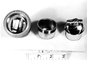 Table cigarette lighter found at the home of Peter and Helen Kroger with messages found