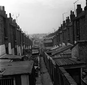 Taken from a set of pictures showing slum housing in post war Britain