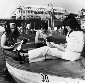 Taking advantage of the warm weather, three of the cast of the Victoria Theatre Company