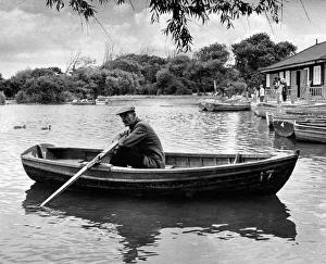 Boating Prints: Taking a well earned rest after a busy season is Redcar boating lake attendant Joe Lloyd